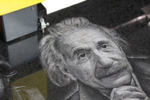 Portrait engraving on black granite created with MPrint Master Stone impact engraving machine